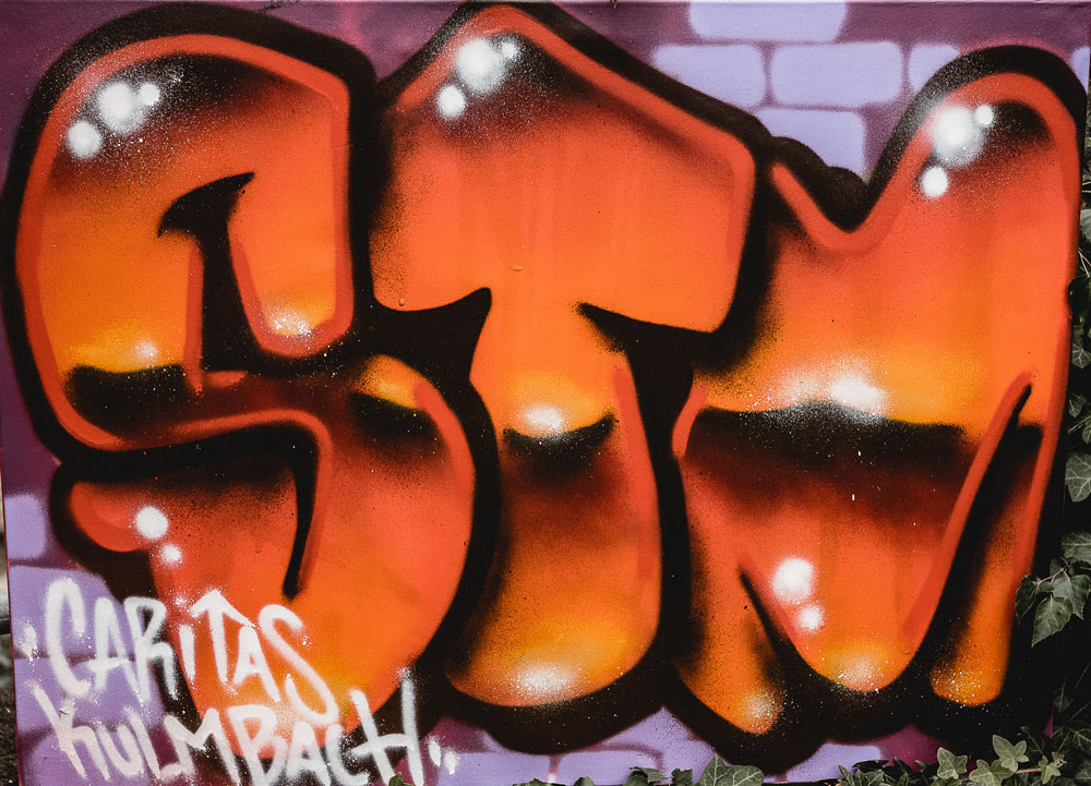 STM - Soziale Trainingsmaßnahmen wie z. B. ein Graffiti-Workshop: Damit integriert der Caritasverband Kulmbach straffällige Jugendliche.